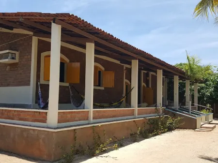 HOUSE OF THE FAMILY WANTED, BETWEEN THE RIVER AND THE SEA