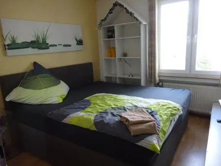 Cozy vacation apartment with 2 bedrooms and balcony Отели в г. Бад-Ротенфельде