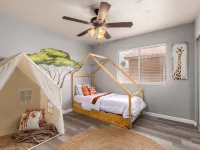 Great location with King Suite, Game Room, HEATED Pool, and Putting Green! Hotels near Around the World Soccer