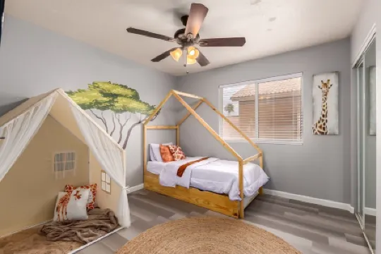 Great location with King Suite, Game Room, HEATED Pool, and Putting Green!