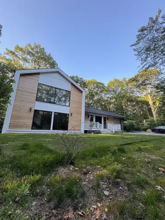 New built exclusive 3-bedroom house in East Hampton with pool, AC, fitness room