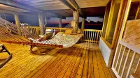 Majestic bayfront home. 450’ pier w/ boat access, crabbing, fishing, & swimming.