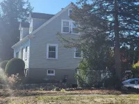 Experience Classic Charm in a Cozy 115-Year-Old Colonial