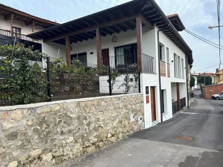 Loylla en Niembro a 500 m de la Playa Planta Baja con Porche A Estrenar Отели в г. Льянес