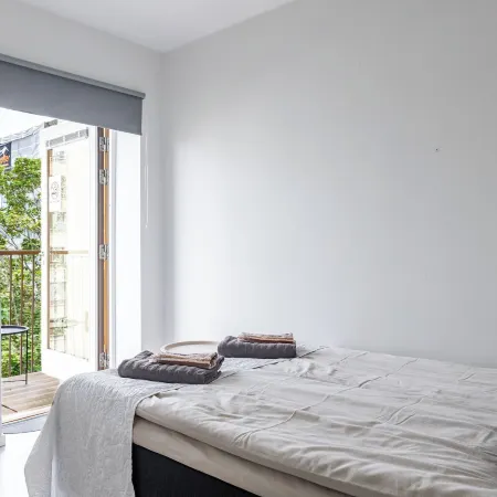 Modern 1BR Home with Sauna & Balcony