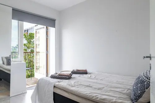 Modern 1BR Home with Sauna & Balcony