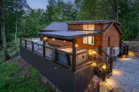 The Mighty Acorn, Bungalow is a delightful cozy tiny home in the woods.