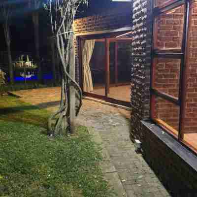 Serene 1-Bedroom Apartment with Garden & Shared Pool Hotel Exterior