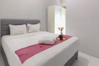 Spacious and Cozy 2BR at Tamansari Prospero Sidoarjo Apartment By Travelio