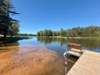 Waterfront Cabin w/ Private Dock & Outdoor Bar near Munising/Manistique - 2-Star