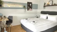 Close to the city center with parking space, balcony, lockable bike box & charging station - Fitnessstudio