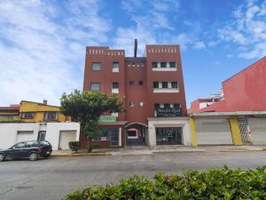 Meson Real Hotel & Suites