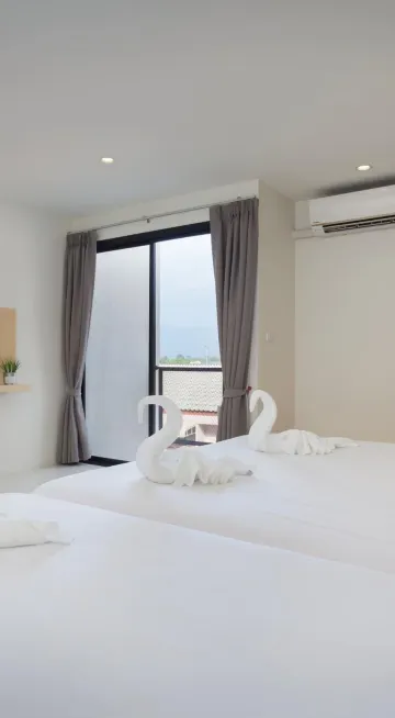 ห้องมาตรฐานพร้อมเตียงใหญ่และเตียงเดี่ยว