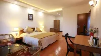 Woodsvilla Resort Ranikhet فنادق في Turkaura
