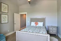 In-town coastal getaway, with a heated pool & level 2 Tesla EV charger on site.