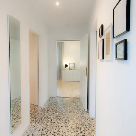 Spacious vacation apartment with garden, surrounded by greenery.