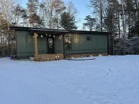 Luxury cabin in county but not far from downtown. Hot tub on back porch.