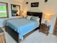 Beautiful Home w/ 2 fireplaces, Deck, and 75ft of Private Higgins Lake Frontage