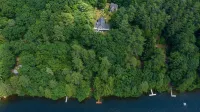 Waterfront Home with ample outdoor entertainment space on Thompson Lake