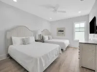 Coastal beach cottage steps away from the white sand beaches!