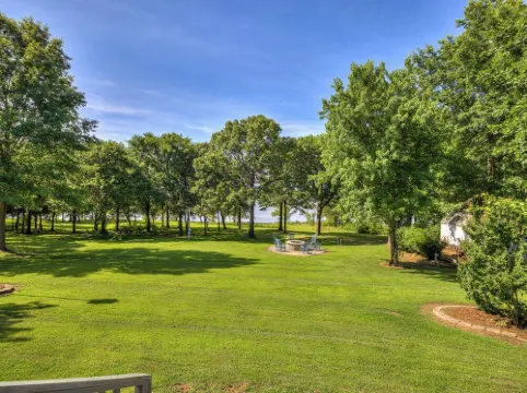Shoreline Lakefront Home with Boat Slip, Fire Pit and Golf Cart