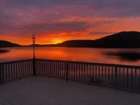 WELCOME TO ON THE ROCK - A RECENTLY RENOVATED  BEAUTIFUL LAKE FRONT HOME