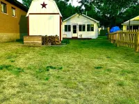 Waterfront house with sandy beach near downtown Hotels in Roscommon County