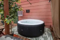 Cozy cabin with 1 bedroom and blow up hot tub & AC in soothing Necedah