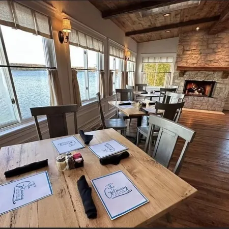 Winter Getaway with Cozy Fireplace in This Elegant Lake Geneva Condo & King Bed.