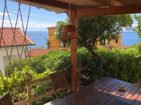 Apartment with exclusive garden and seaview in Pomonte, 50 meters from the sea