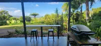 NEW -The Sugar Shack, Ocean views over cane fields from your outdoor Spa Bath