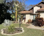 Close to beach! Family-sized home with pool and hot tub.