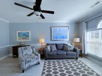 First Floor Updated Coastal Summer Retreat at Magnolia Place - Pool View