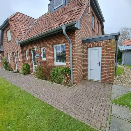 Comfortable Vacation Home with Sauna in Neßmersiel 1 Min. to the Indoor Playground