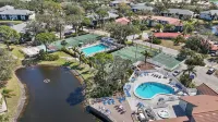 Sunshine 2-bedroom Shorewalk condo near beaches, IMG - Pickleball, Pool Lakeview