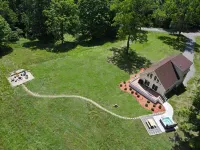 Welcome to Twin Creeks. A brand-new Chalet with hot tub,WiFi, and AC on 32 acres