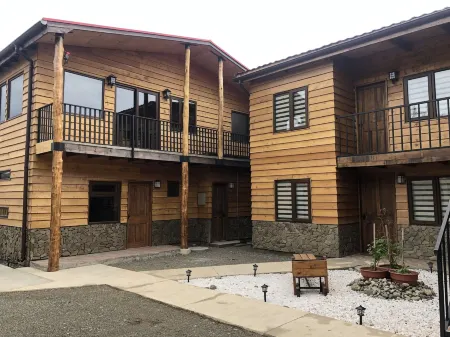 Magellanicus Rustic Suites Отели в г. Магальянес
