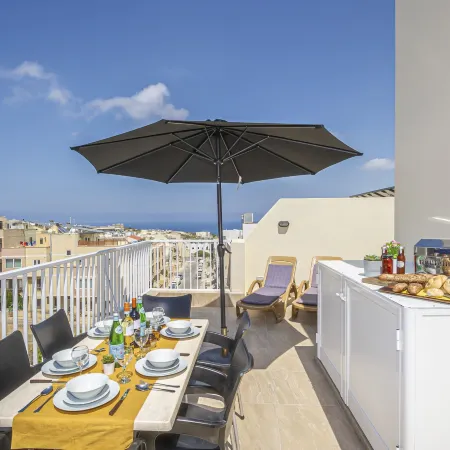 Summer Breeze Penthouse with Large Terrace and Hot Tub by Getaways Malta