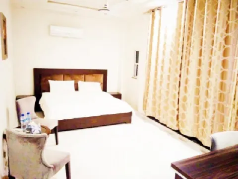 Jade Dragon Hotel DHA Lahore Отели в г. 