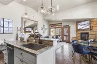 Fireplace and Balcony with Seating - Stunning Mountain Modern Retreat