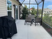 Charming Corner Lot with Golf Cart and Screened Lanai - Inviting Escape