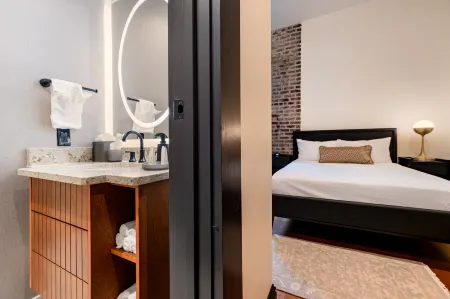 3BR Group Haven + Private Patio Walk to French Quarter | The Mayfair