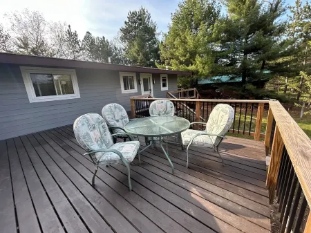 Castle Rock Lakefront Home, with pier, sand bottom, and wrap around deck