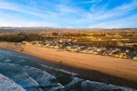 Spacious Deck and Fun Entertainment Options - Charming Coastal Escape