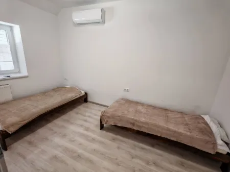 WorkStay Apartment – Modern Comfort with Private Parking, Near City Amenities