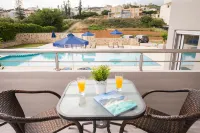Irini Stalos Apartments - Beach