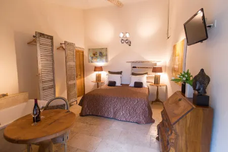 Domaine les Roullets Отели в г. Гульт