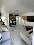 Modern oasis loaded w/amenities! 5-8 mins to the beaches, shops dining & ferries