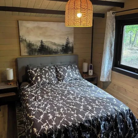 Riverside cabin in the woods