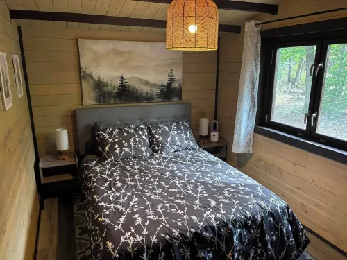 Riverside cabin in the woods